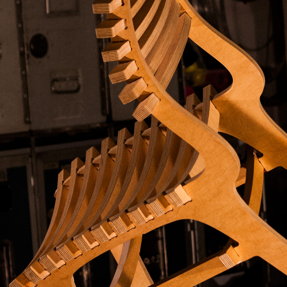 A close-up of the bones of the chair, a lovely curve that cushions your posterior